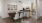 a kitchen with a table and chairs