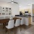 a kitchen with a table and chairs
