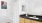 a bathroom with a black countertop